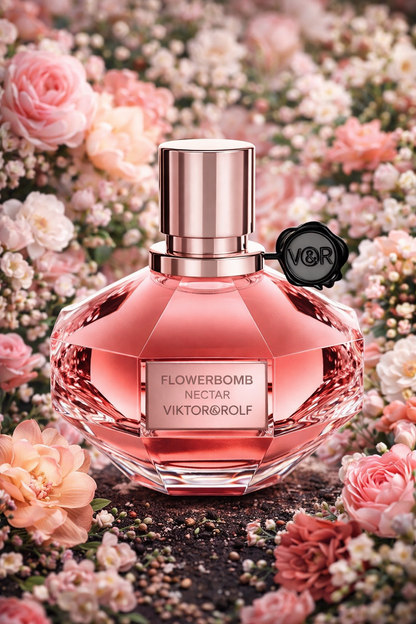 Viktor & Rolf Flowerbomb Nectar perfume bottle on a floral background